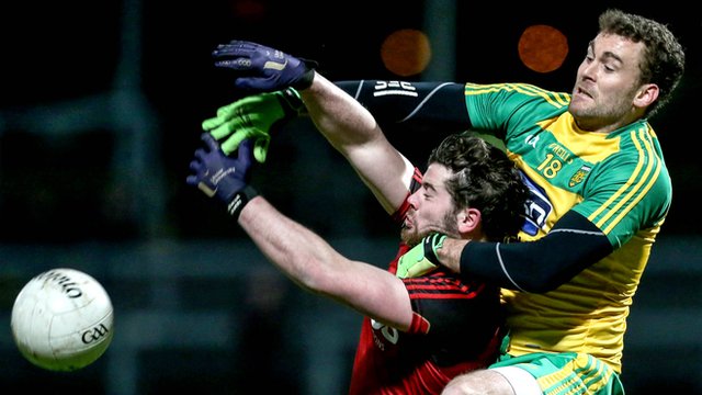 Down's Niall Madine battles with Donegal's Eamon McGee at Pairc Esler