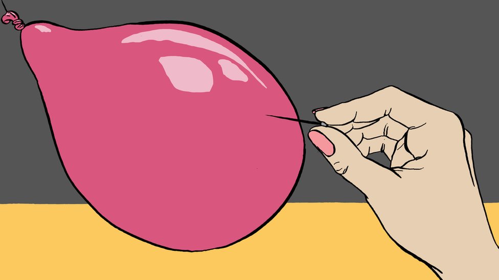 رسم توضيحي لشخص يثقب بالونة باستخدام إبرة