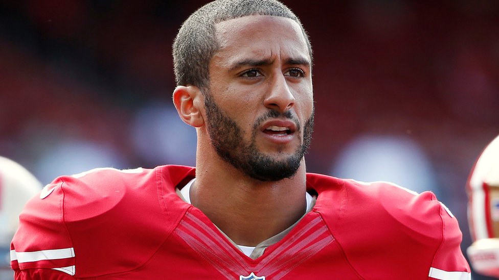 NFL on Kaepernick: Players 'not required' to stand during national