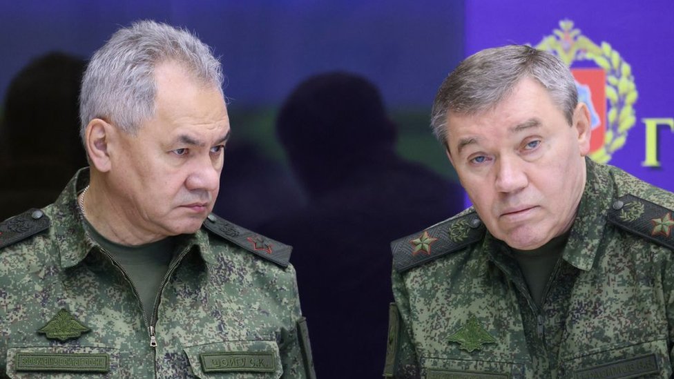 Russian Defense Minister Sergei Shoigu (left) and Russian Chief of Staff Valery Gerasimov (right) during the Russian president's visit to the joint staff of forces participating in the Russian military operation in Ukraine at an undisclosed location on December 17, 2022