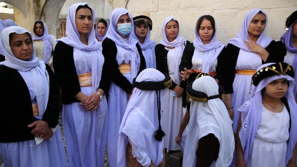 Yazidis don special clothing for the ceremony to appoint their new spiritual leader