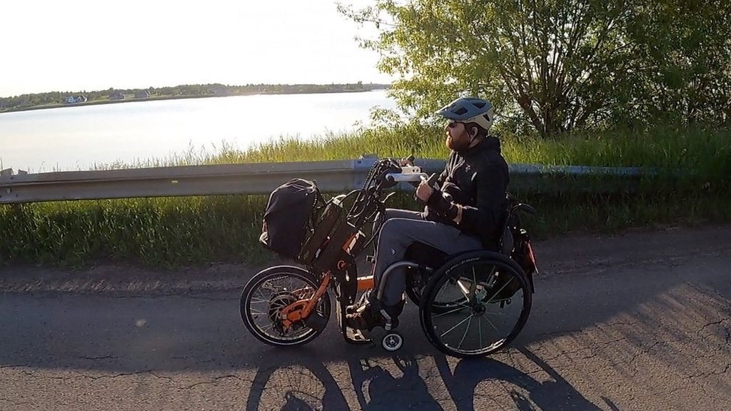 Quadriplegic man cycles across Canada