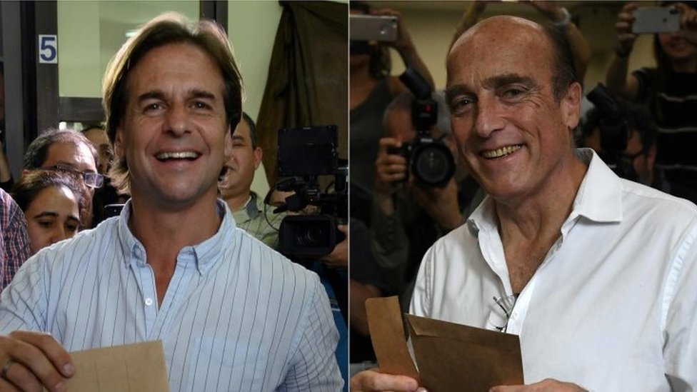 Луис Лакаль (слева) на избирательном участке и Даниэль Мартинес, также на избирательном участке в день выборов
