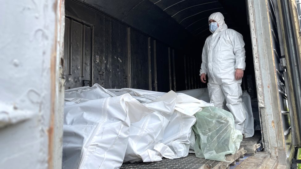 The dead Russian bodies are placed in refrigerated train carriages