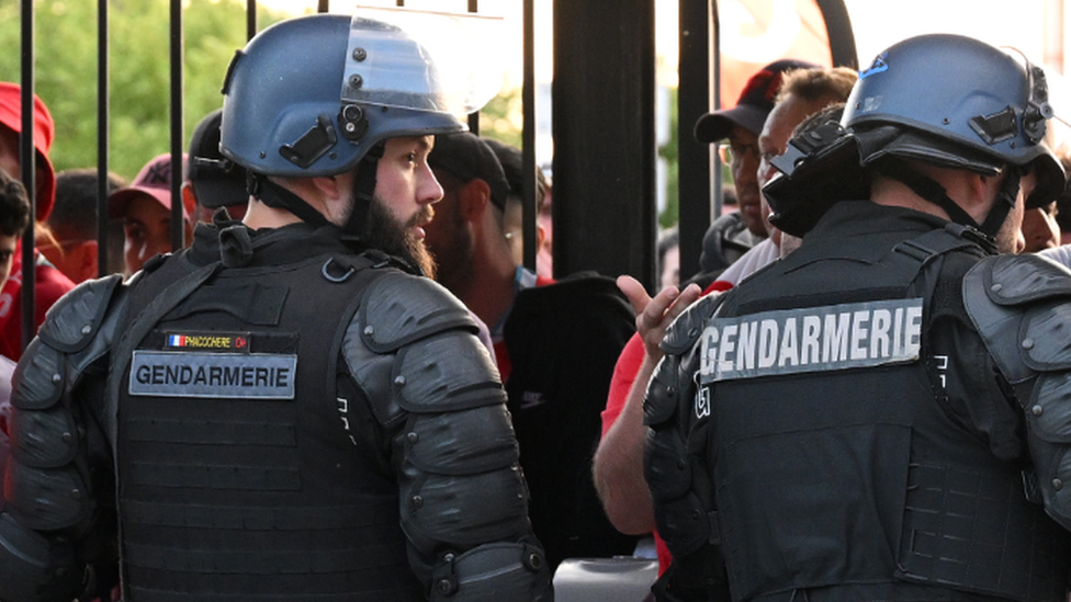French police and Liverpool fans outside the Stade de France stadium in Paris. Photo: 28 May 2022