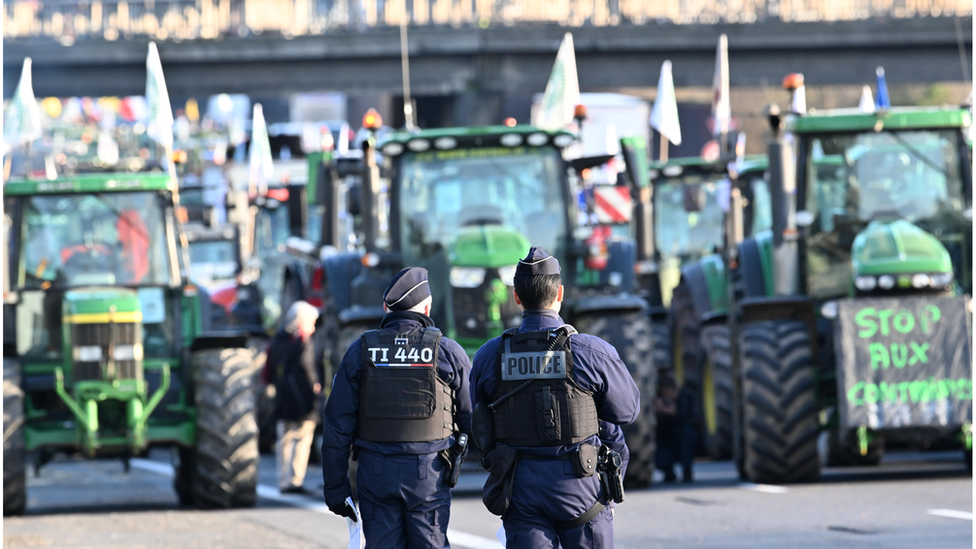French farmers block a road in French capital Paris