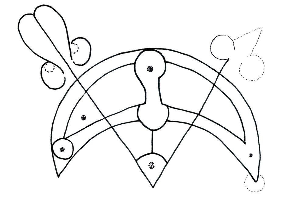 Изображение полумесяца и резьбы по V-образному стержню на камне