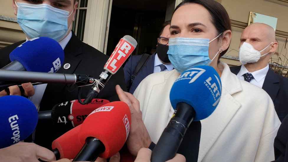 Belarus opposition leader Svetlana Tikhanovskaya emerges from her meeting with French President Emmanuel Macron