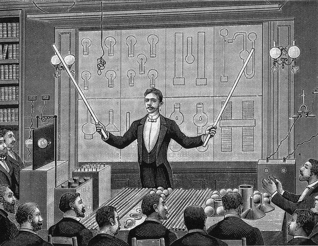 Inventor Nikola Tesla (1856 - 1943), lectures before the French Physical Society and the International Society of Electricians, Paris, France.