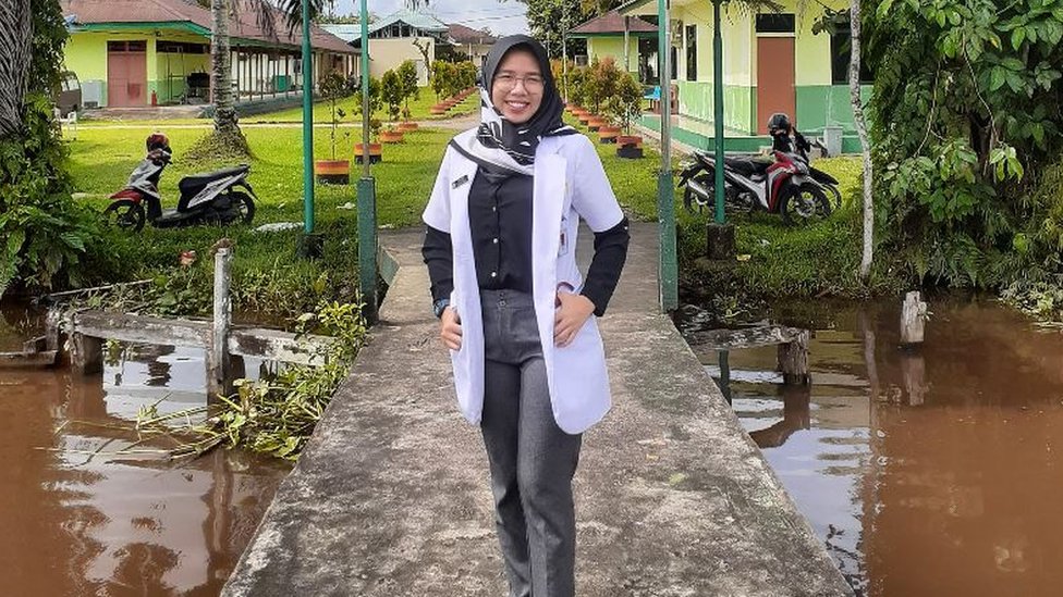 Fithriyyah Iskandar stands in front of her hospital