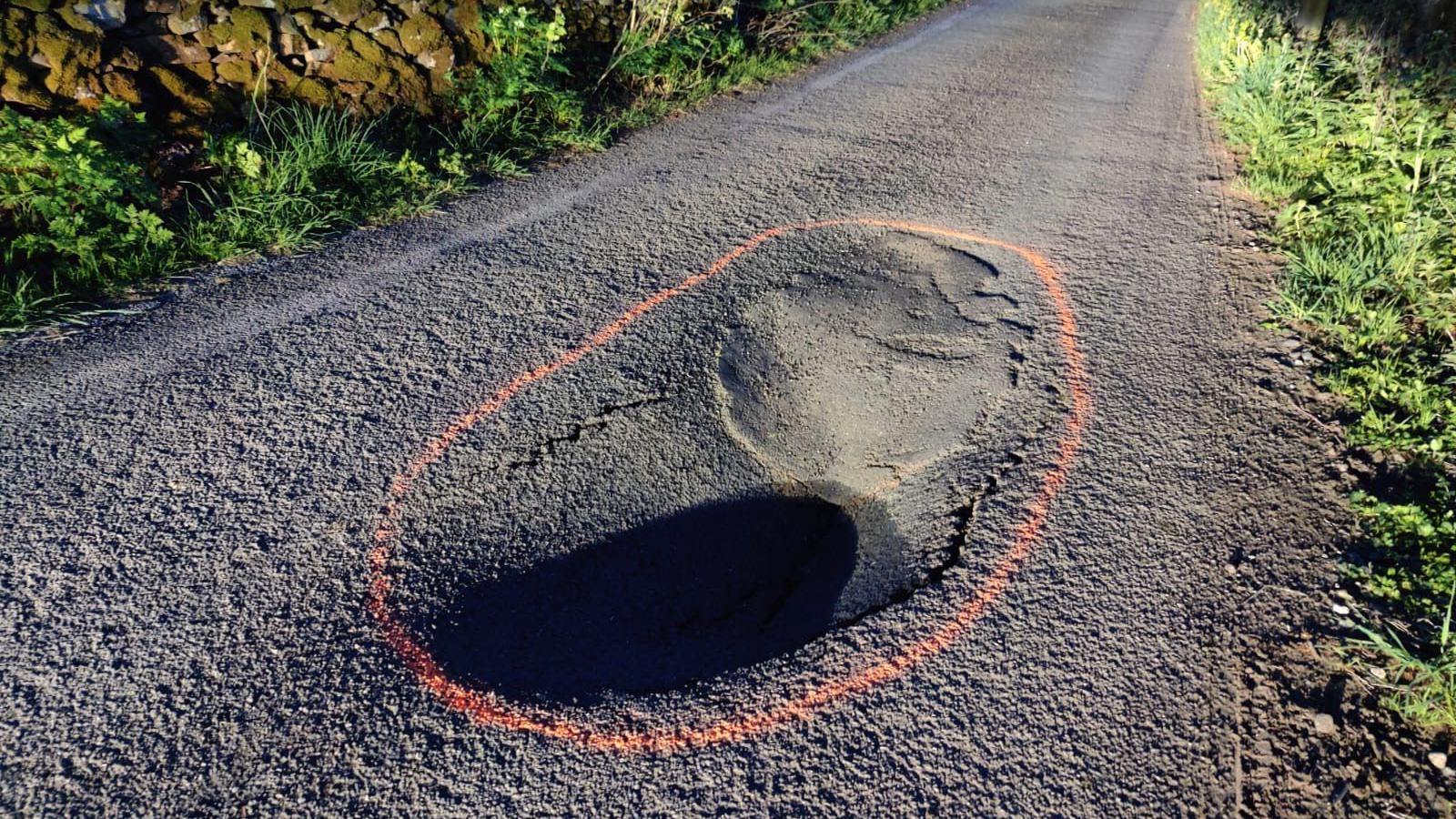 Lake District road closed due to sink hole - BBC News