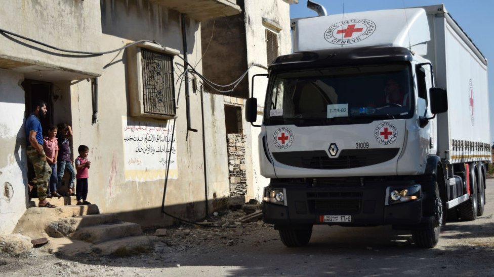 Помощь прибыла в контролируемый повстанцами город Талбиссех на северной окраине Хомса 19 сентября 2016 г.