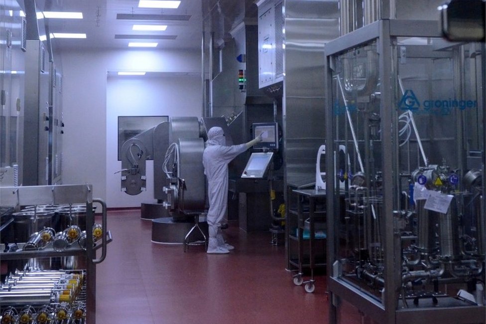 A research scientist works inside a laboratory of India"s Serum Institute, the world"s largest maker of vaccines, which is working on vaccines against the coronavirus disease