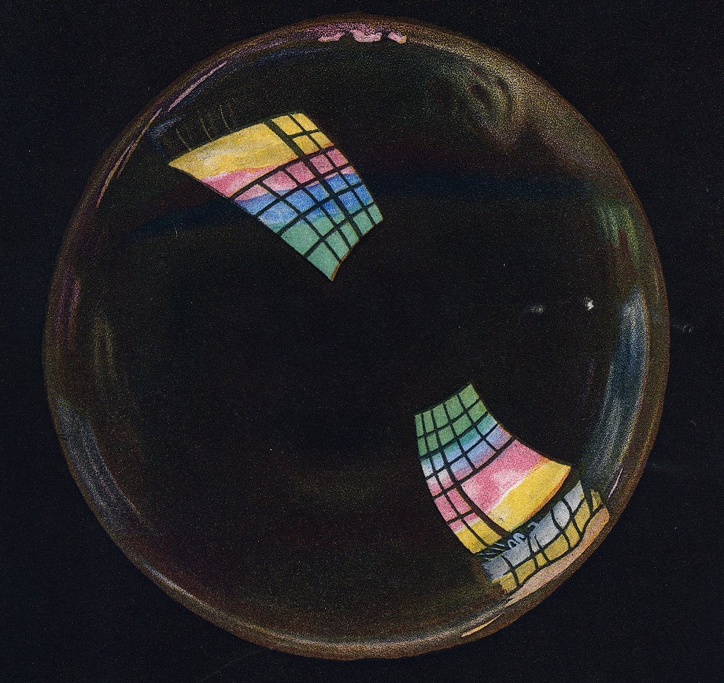 Detalle de placa de Thomas Young mostrando colores en burbuja de jabón