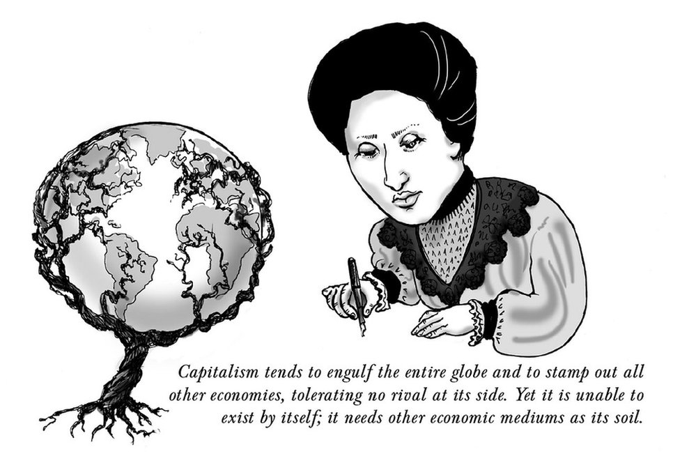 Rosa Luxemburg writing, sitting next to a globe