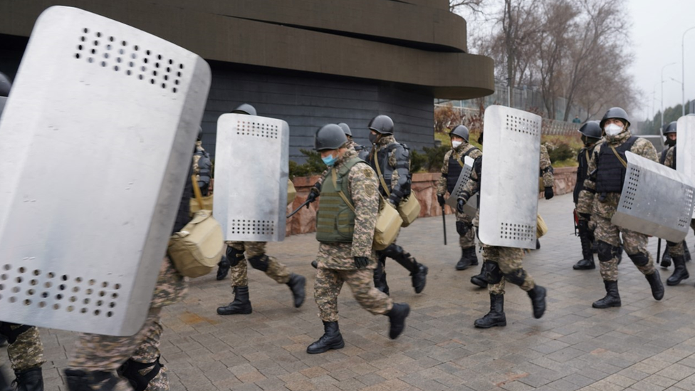 Riot police in Almaty