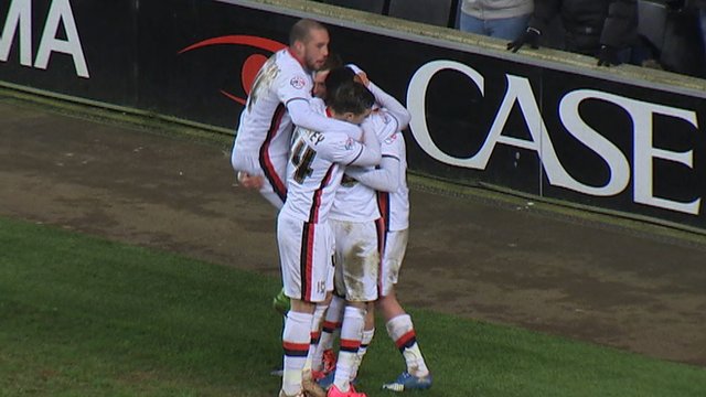 Ben Reeves celebrates his goal for MK Dons