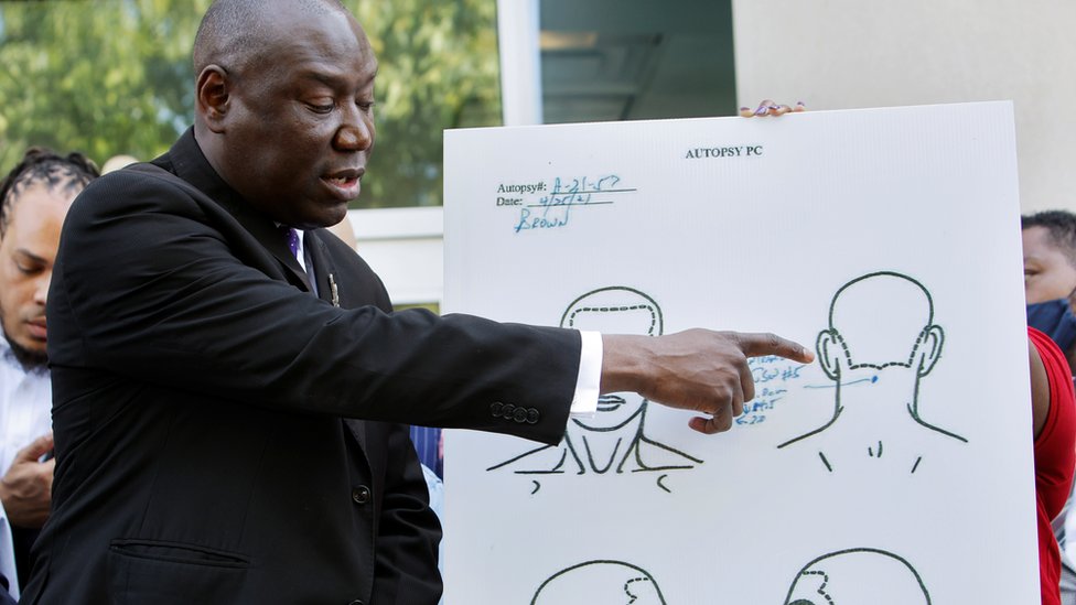 Ben Crump points to a diagram showing the fatal shot taken by Andrew Brown
