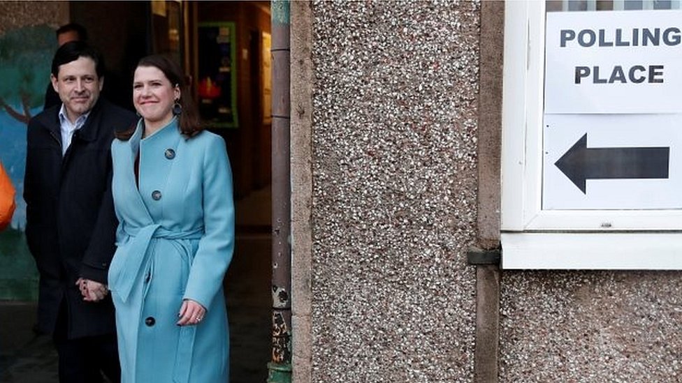 Lib Dem leader Jo Swinson and her husband Duncan Hames leave polling station