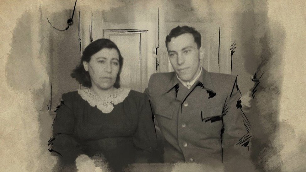 Foto blanco y negro de Yevgeny Gershovich, ya adulto, con una mujer