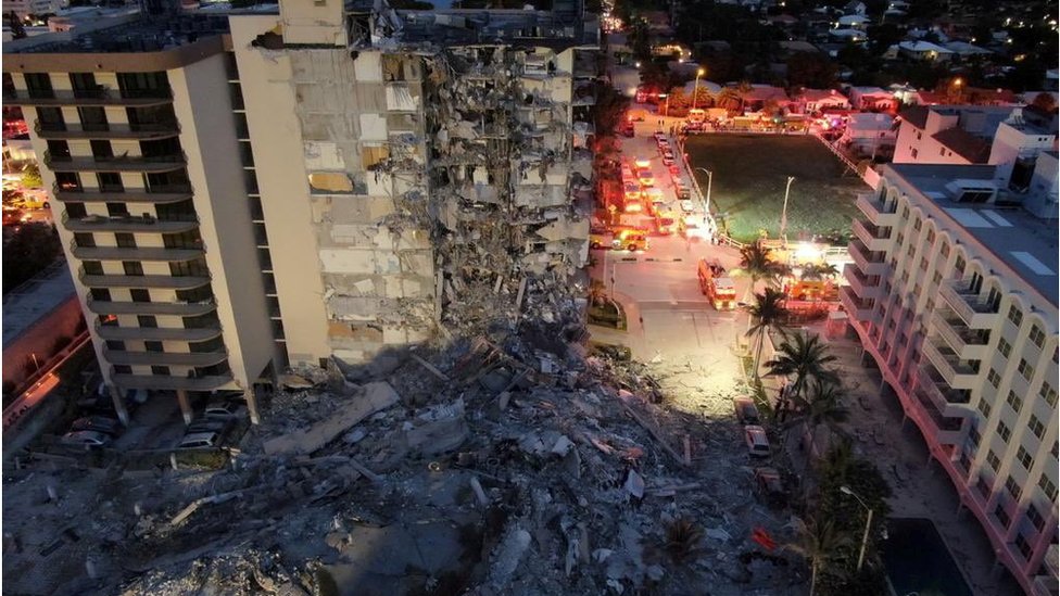 Miami building collapse: Rescuers listen for signs of life in rubble