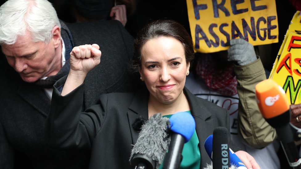 Wikileaks founder Julian Assange's partner, Stella Moris, raises her fist as she speaks to the media outside the Old Bailey, London, following the ruling that he cannot be extradited to the United States. Assange, 49, was facing an 18-count indictment, alleging a plot to hack computers and a conspiracy to obtain and disclose national defence information.