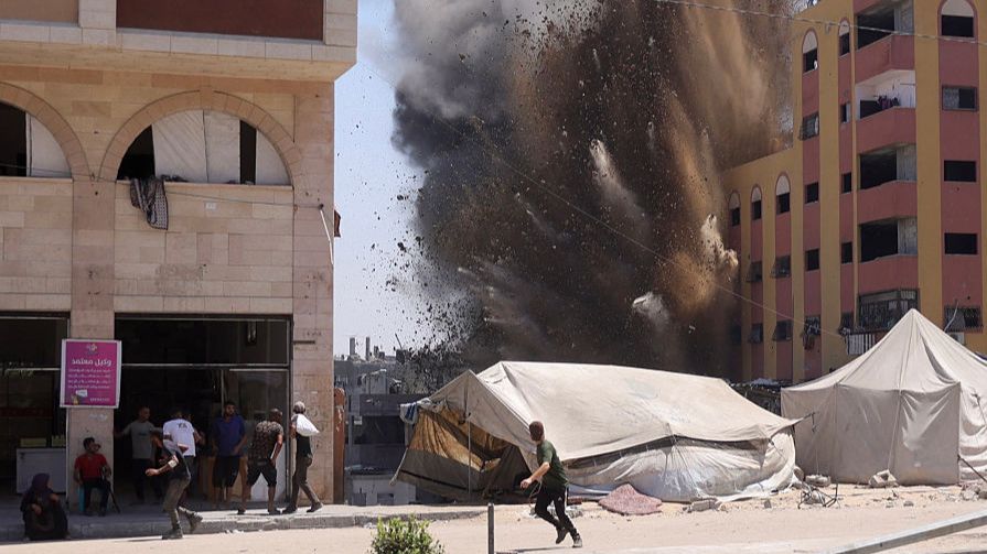 Palestinians flee Gaza City districts as Israel says first stages of offensive have begun