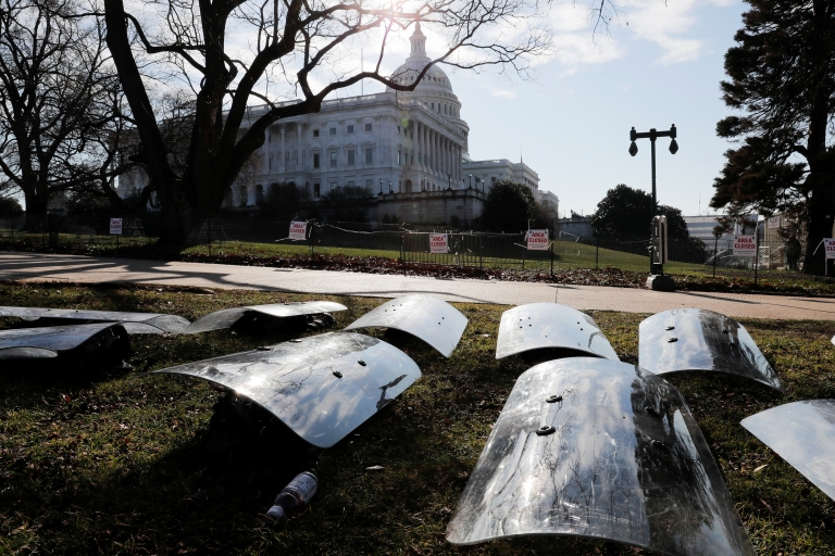 US National Guard riot shields are laid out at the ready outside the Capitol Building