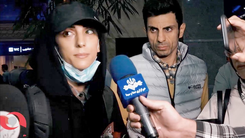 Elnaz Rekabi is interviewed by Iranian media at Tehran's international airport on 19 October 2022