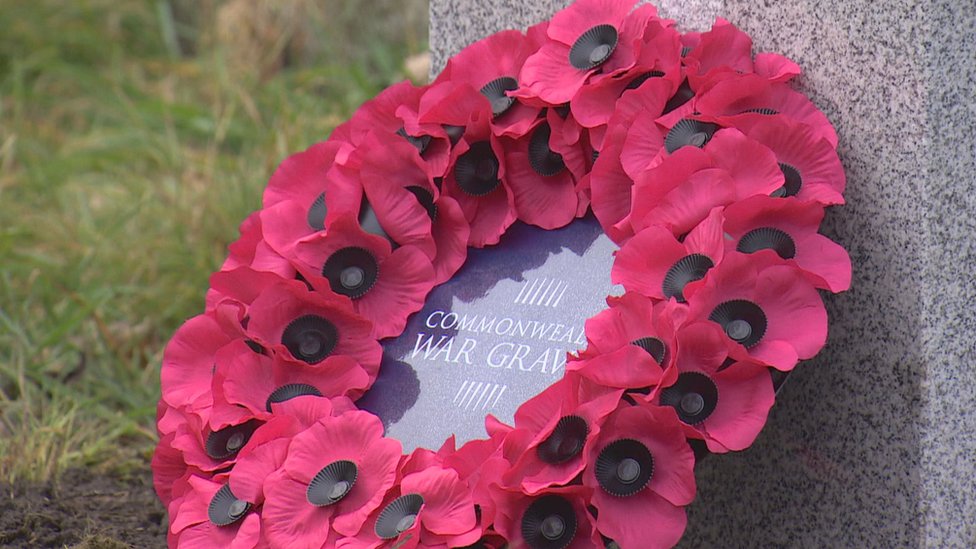 A wreath laid at the new gravestone for Gunner Peter Liddiard who died during WW1