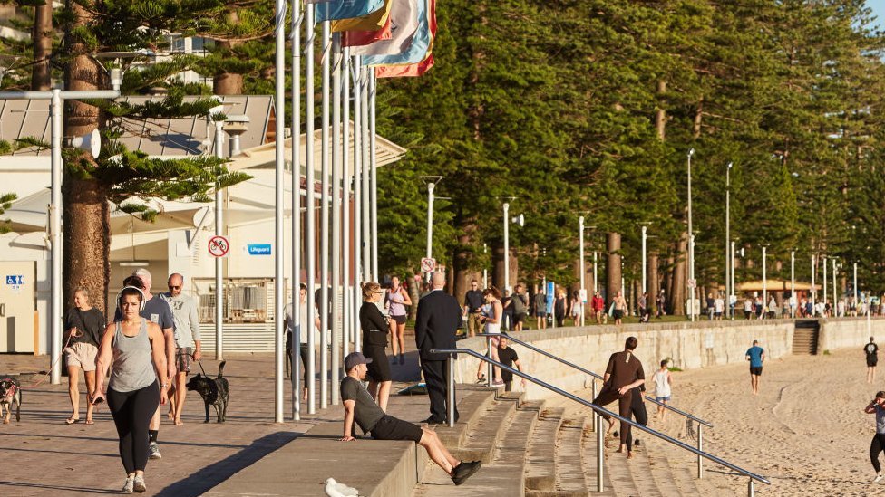 People seen on Manly Beach on Wednesday during the region's lockdown