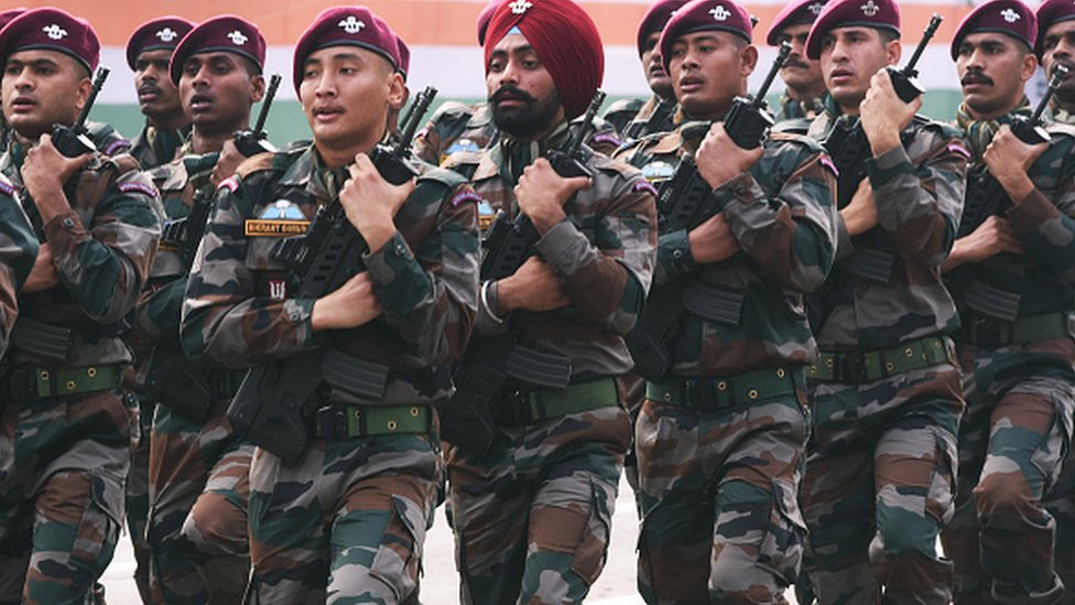 Indian army's paratrooper special force soldiers march past during the Republic Day parade in Kolkata on January 26, 2022