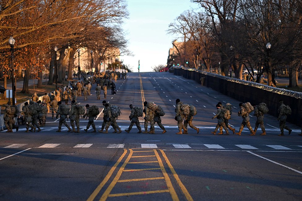 Troops prepare to exit the Capitol after the inauguration of Joe Biden as the 46th President of the United States, in Washington DC, 20 January 2021.