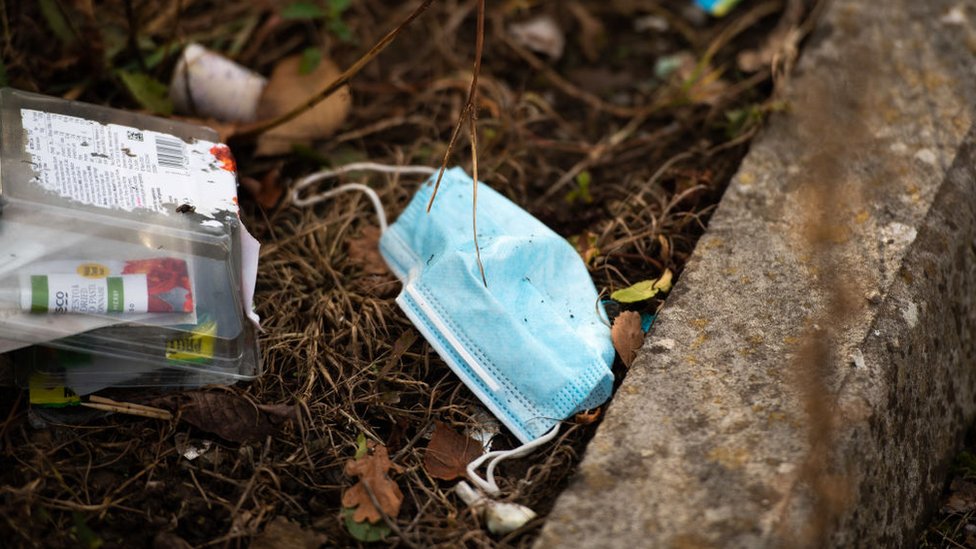 Covid: Disposable masks pose pollutants risk, study finds - BBC News