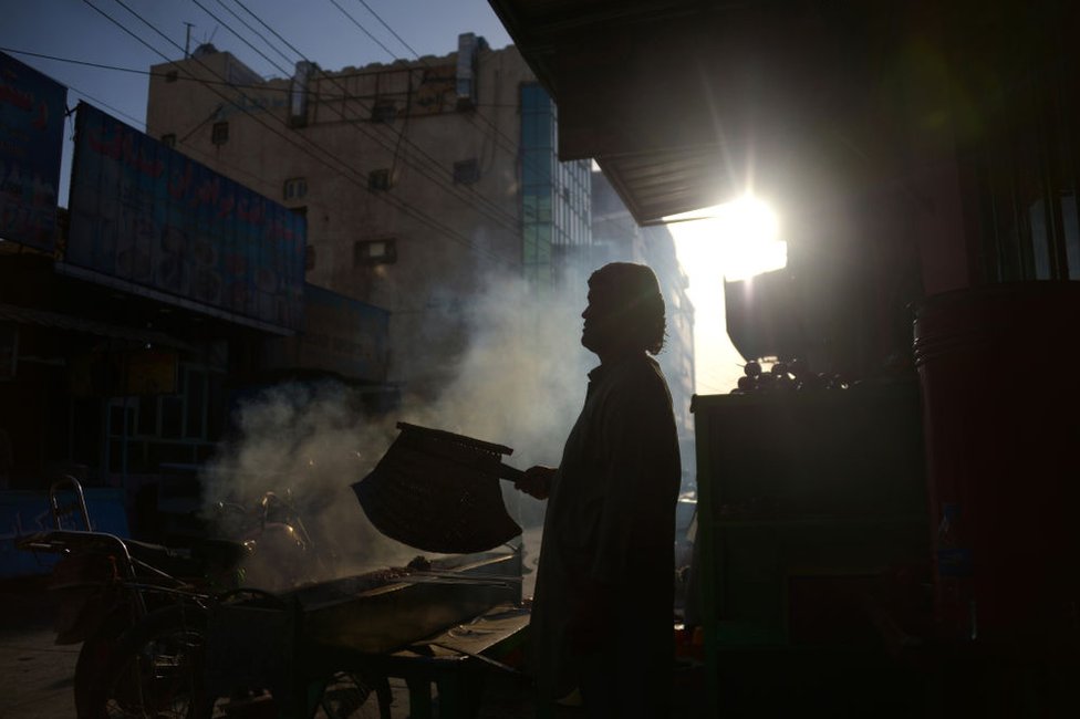 An Afghan street vendor in Mazar-i-Sharif. The city is home to a small community of Uyghurs.