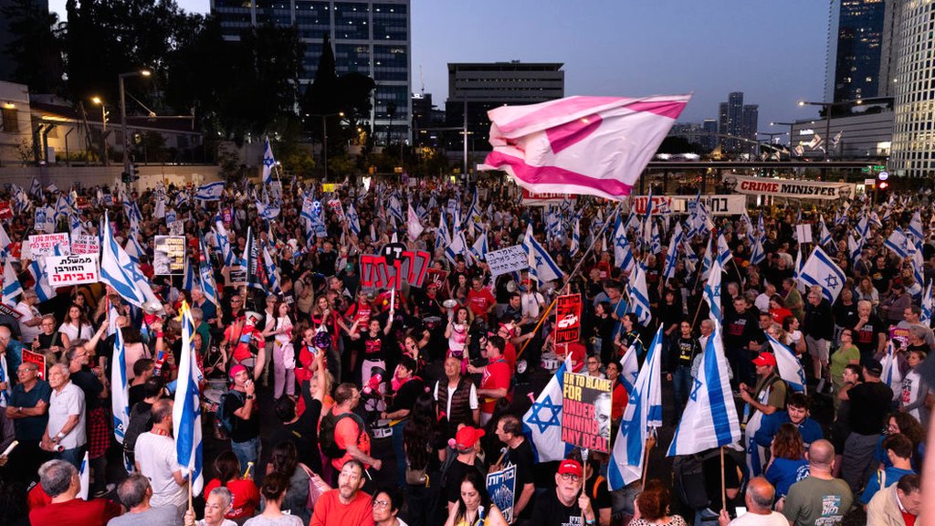 Israel-Gaza war: Tens of thousands rally for hostage deal as Gaza ceasefire talks continue