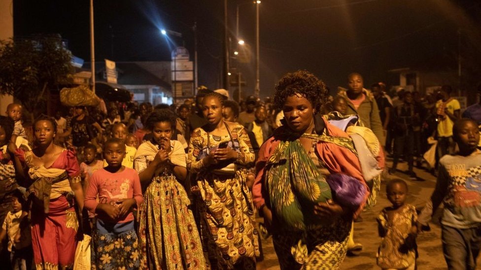 Goma residents are seen leaving the city following a sudden activity of the Nyiragongo volcano