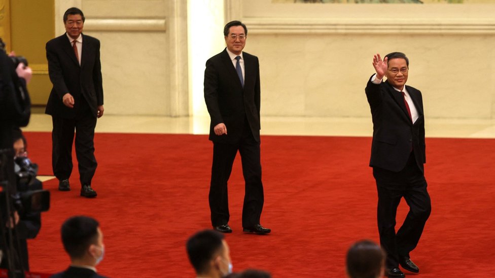 Chinese Premier Li Qiang (R), alongside Chinese Vice Premiers Ding Xuexiang (C) and He Lifeng (L), attends a news conference following the closing session of the National People"s Congress (NPC), at the Great Hall of the People, in Beijing, China, 13 March 2023