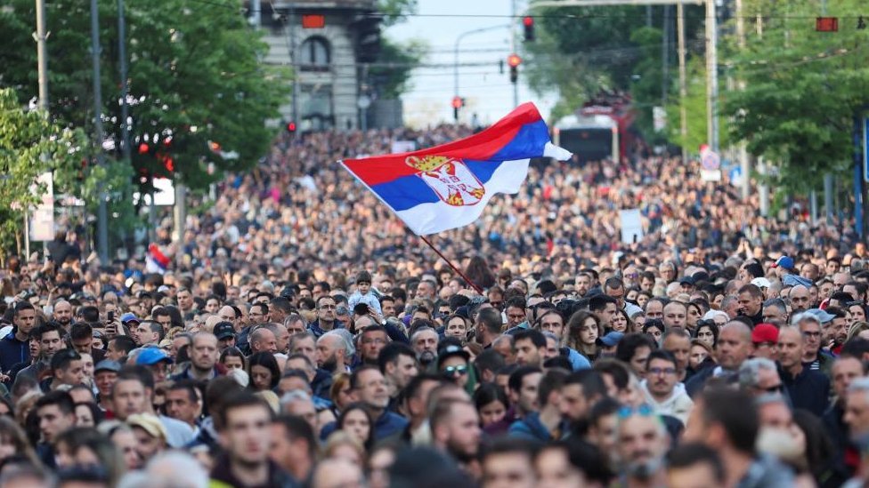 Serbia shootings: Tens of thousands join protests