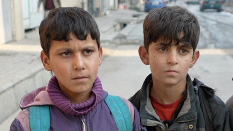 Afghanistan: Children in Kabul working for a piece of bread