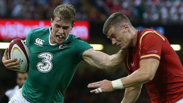 Andrew Trimble attempts to get past Wales's Scott Williams in last weekend's game at the Millennium Stadium