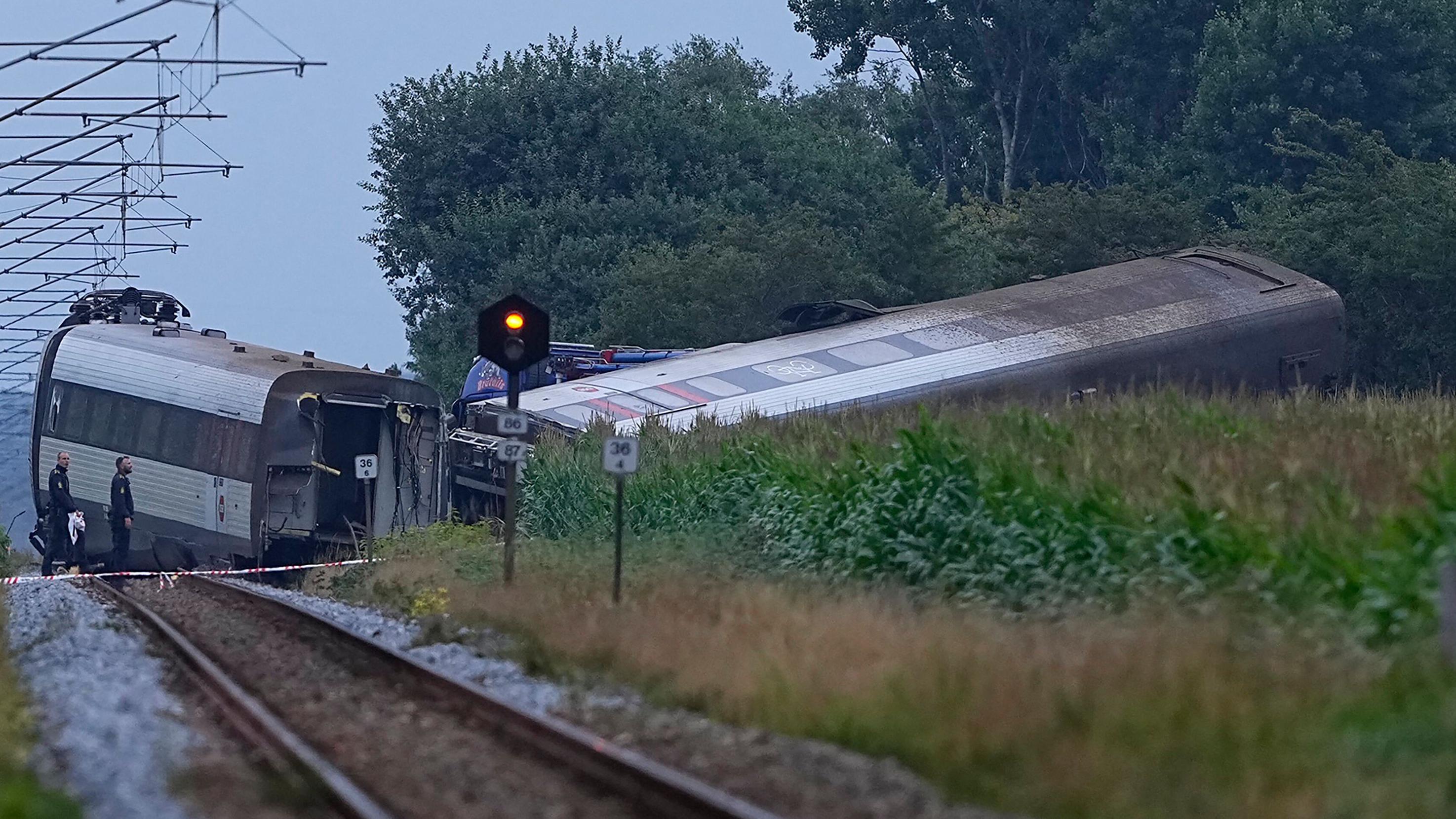 One dead and several injured as Danish train hits tanker and