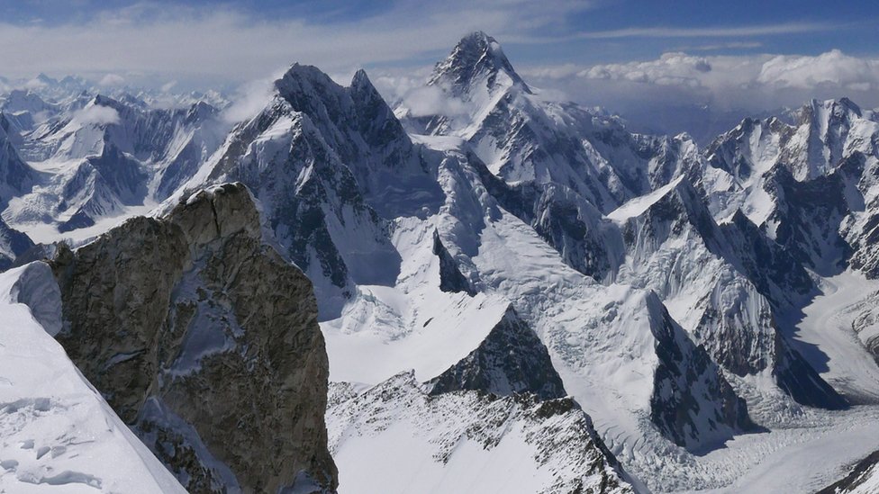 View from the summit of Gashebrum 2(8035m) towards Broad Peak (8047m) and K2 (8611m, the highest mountain visible in the photo