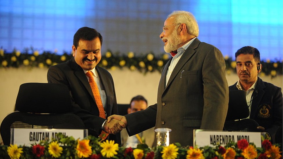 : Gujarat Chief Minister Narendra Modi and Chairman Of Adani Group Gautam Adani at 5th Vibrant Gujarat Global Summit on January 13, 2011 in Gandhinagar, India.
