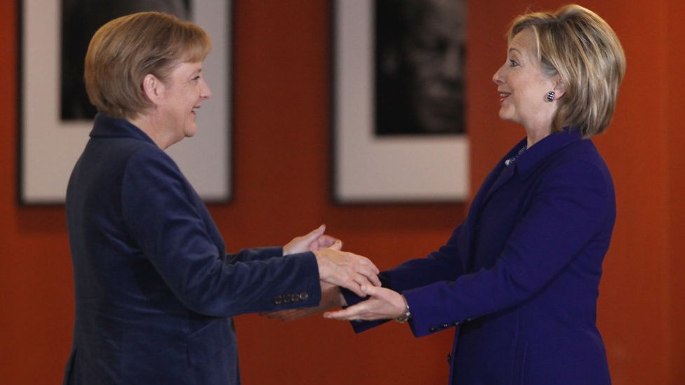Angela Merkel y Hilary Clinton