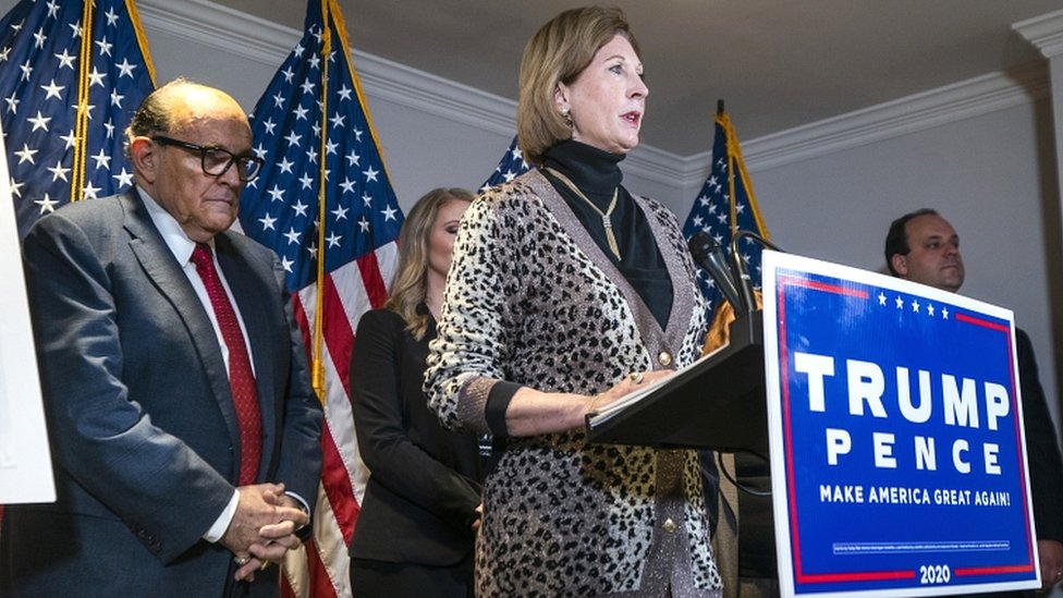 Attorney Sidney Powell (C), a member of US President Donald Trump's legal team, speaks alongside Trump lawyer and former mayor of New York City Rudy Giuliani (L) about the president's legal challenges to his election loss to President-elect Joe Biden in the Republican National Committee Headquarters in Washington, DC, USA, on 19 November 2020