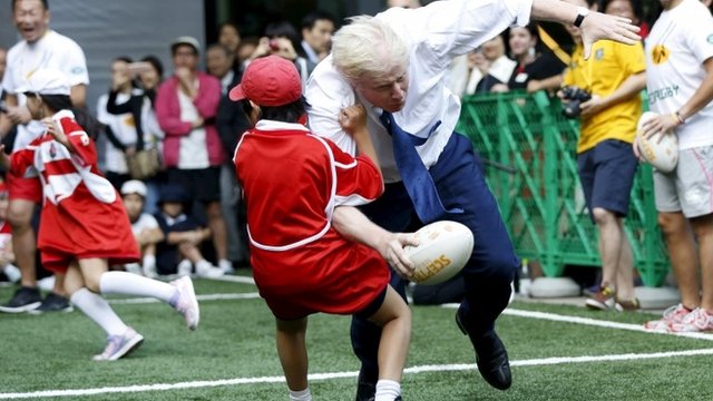 Boris Johnson rugby tackles schoolboy in Japan: His other sporting ...