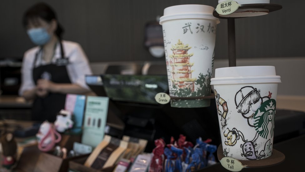 Illustrations drawn by employees on coffee cups at Starbucks on during the Five-day May Day holiday on May 03, 2020 in Wuhan