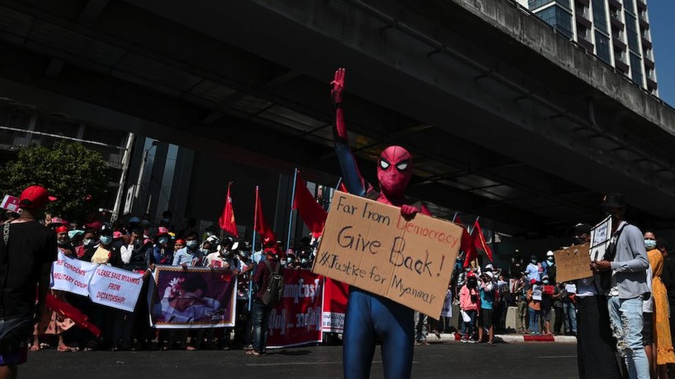 A protestor wearing a Spiderman costume gives the three-finger salute as he rallies against the military coup and to demand the release of elected leader Aung San Suu Kyi, in Yangon, Myanmar, February 10, 2021.