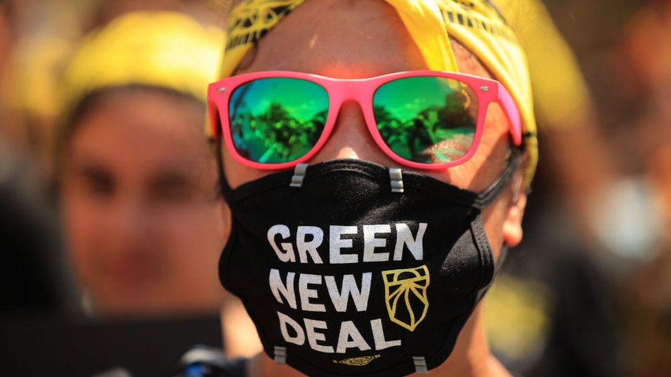 Protesto em Washington pede ao presidente americano Joe Biden que transforme o 'Green New Deal' em lei (junho de 2021)